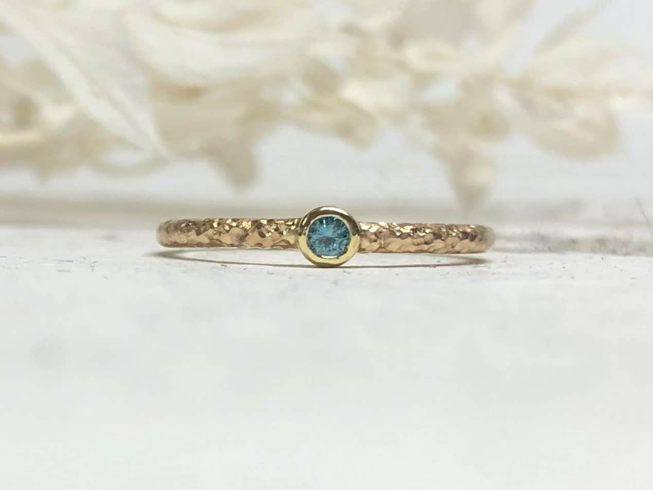 Rosegoldring mit blauem Stein "Thetes 2" 1 Rosegoldring mit blauem Diamant Thetes 2